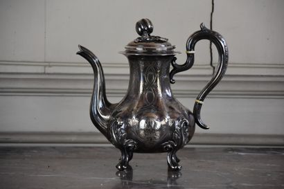  Silver coffee pot with Minerva mark 
Standing on leafy feet, flower-shaped frétel,...
