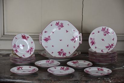 null Limoges porcelain service by Raynaud 

Decorated in pink monochrome with flowers,...