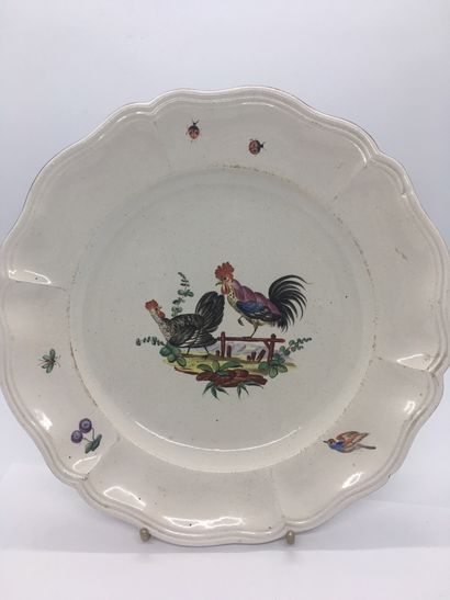 null SAINT CLÉMENT, 18th century

Earthenware plate decorated with roosters in the...