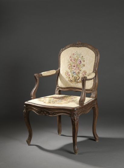 null Louis XV period molded wood armchair by Tilliard

Decorated with shells and...