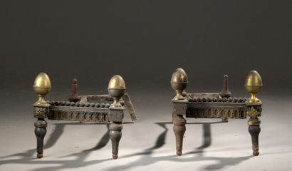 null Pair of gilt brass and steel andirons from the late Louis XVI period

Decorated...