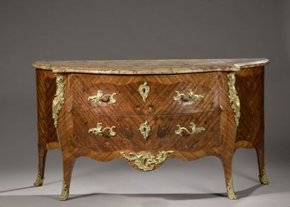 null A Louis XV period chest of drawers with doors in violet wood veneer and end...