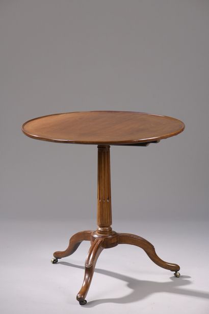null A Louis XVI period mahogany and mahogany veneer pedestal table attributed to...