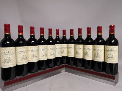  12 bottles Château MALARTIC LAGRAVIERE - Grand Cru Classé de Graves 2009 In wooden...