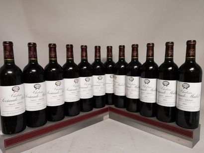 null 12 bouteilles Château SOCIANDO MALLET - Haut Médoc 2001 En caisse bois.