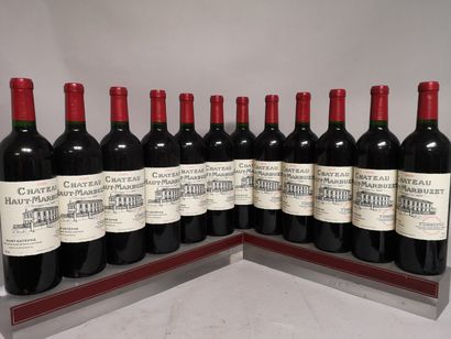 null 12 bouteilles Château HAUT MARBUZET - Saint Estèphe 2000 En caisse bois.