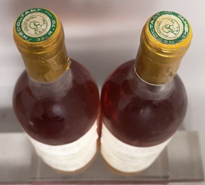  2 bouteilles Château HAUT BERGERON - Sauternes 1986 Etiquettes tachées. Niveaux...