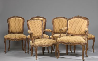 Fauteuil à dossier plat A Louis XV period flat back armchair in natural wood with...