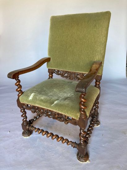 FAUTEUIL, XIXe siècle Natural wood armchair turned and carved with coat of arms and...