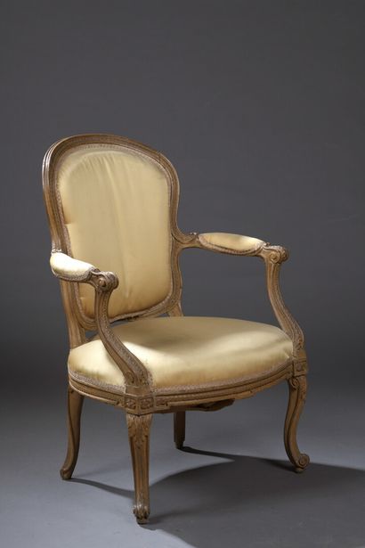  A molded and carved wood armchair stamped JB BOULARD from the Transition period...