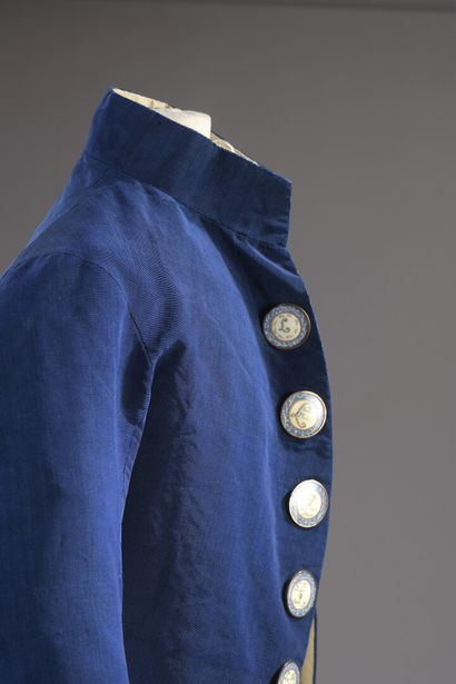 null A young man's suit with rebus buttons, circa 1785-1788, a suit with basques...