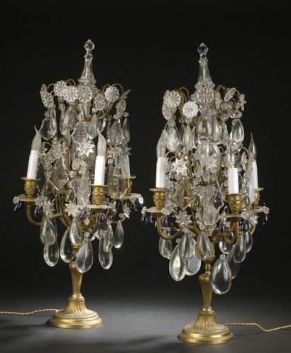 A pair of Louis XVI style cut crystal girandoles...
