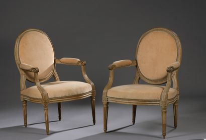  A pair of Louis XVI period moulded and carved wooden armchairs stamped J. LECHARTIER...