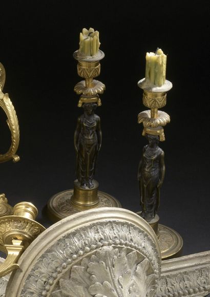 A pair of Empire period gilt and chased bronze...