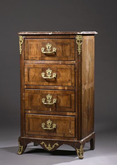  Violet wood chiffonier, early Louis XV period 
It opens with four drawers in front...
