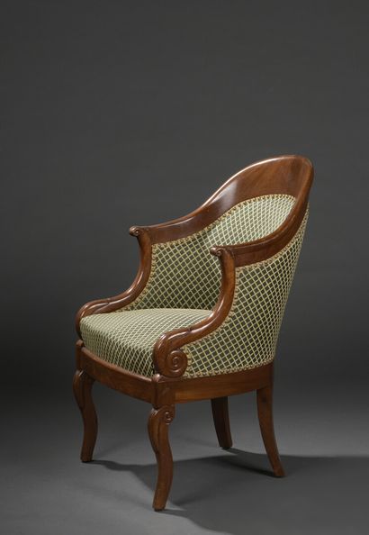 null A Louis-Philippe period mahogany and mahogany veneer armchair 
With a gondola...