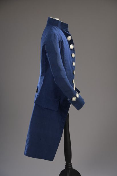 null A young man's suit with rebus buttons, circa 1785-1788, a suit with basques...