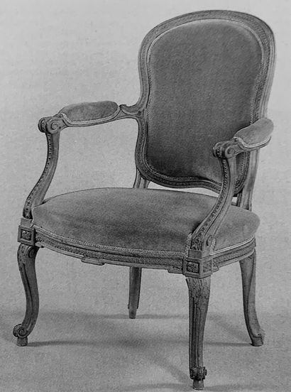  A molded and carved wood armchair stamped JB BOULARD from the Transition period...