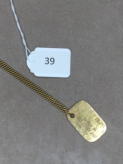 null Lot d'une chaine et d'une plaque en or et alliage d'or.

PBT. 28,24 g