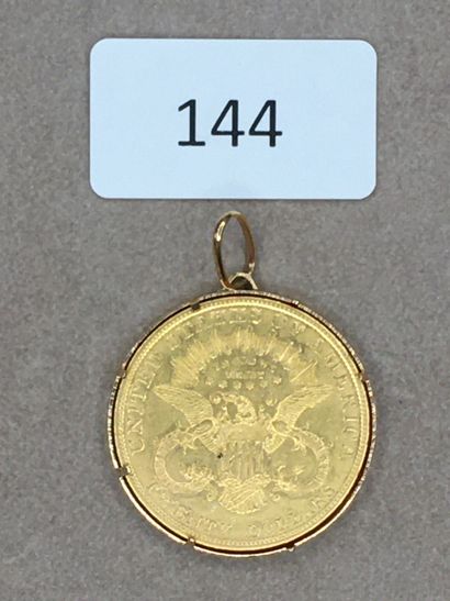 null Pendentif en or jaune serti d'une pièce de 20 Dollar US Liberty 1904.

PBT....