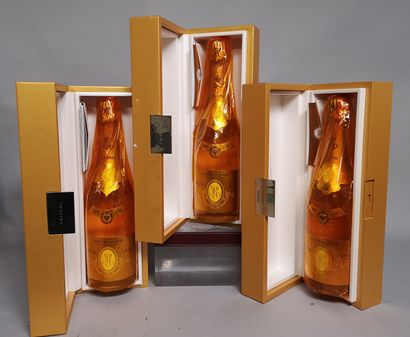 Three bottles of CHAMPAGNE CRISTAL de ROEDERER...