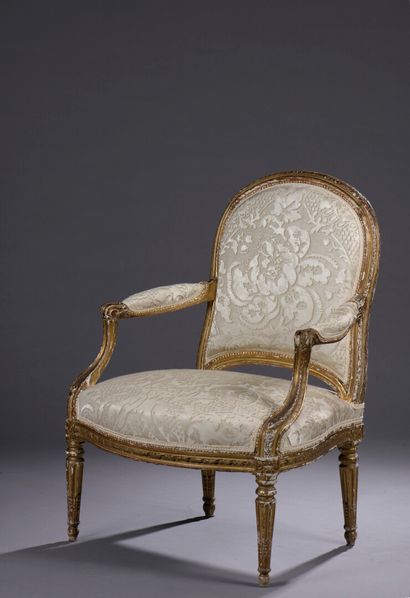  Armchair with flat back in carved and gilded...