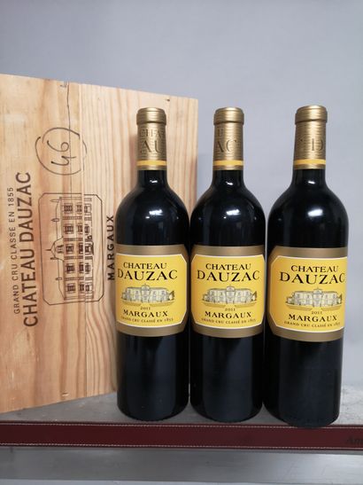 null Three bottles Château DAUZAC - 5th Gcc Margaux 2011 

In wooden case.