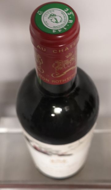 A bottle of Château MOUTON ROTHSCHILD 1er...