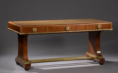  Mahogany and mahogany veneer flat desk, Regency work, circa 1900 
It opens to three...