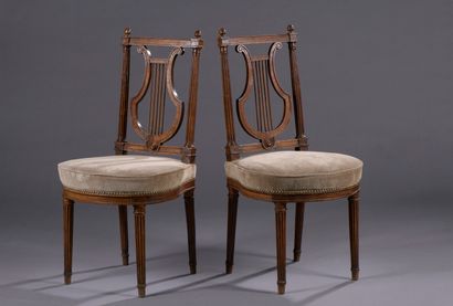 null Pair of molded and carved wood chairs, stamped H. Jacob of Louis XVI period

Lyre...