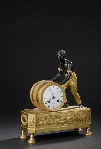 null Nubian clock in chased and gilt bronze, circa 1810

Decorated with a Nubian...