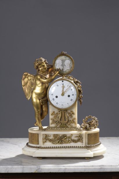 null 
Bronze and white marble clock from the Louis XVI period




Decorated with...