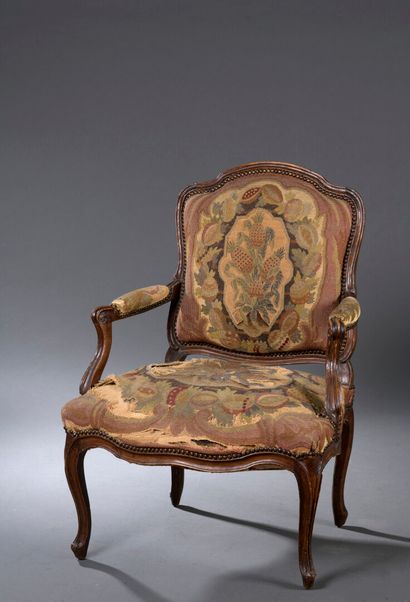  Molded wood armchair stamped L. C. CARPENTIER of Louis XV period 
Small accidents,...