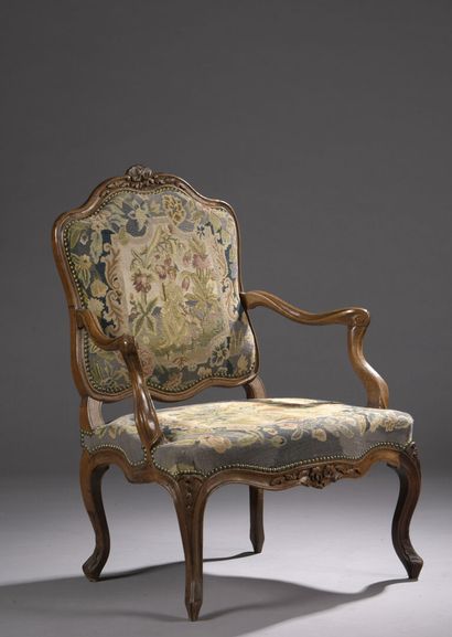 null Armchair in molded and carved walnut attributed to Nogaret, Lyon work of the...