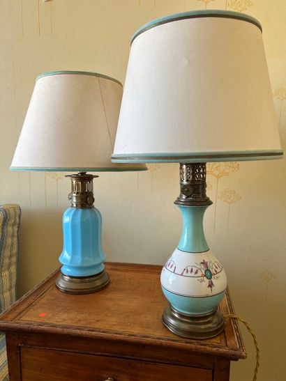 Set of two porcelain and opaline oil lamps...