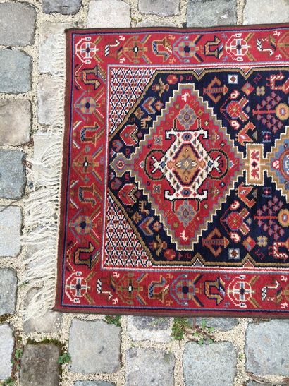 null CAUCASUS, XXth century

Woolen gallery carpet with geometrical decorations,...