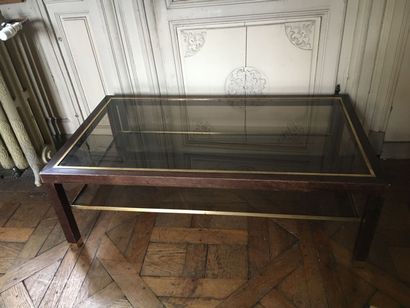 null Table basse en verre et bois rectangulaire

H. 39, L. 114, P. 64 cm 



On y...