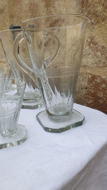 null 
Part of a square stemmed glass set including 60 glasses and a pair of jugs...