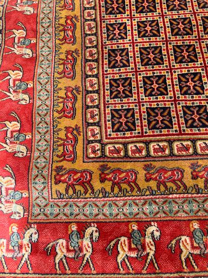 null PERSIA, 20th century

Woolen carpet with geometrical decoration, border decorated...