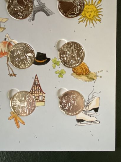 null Trois livrets - Monnaie de Paris 

- 12 pièces de 10€ en argent 2014 : Les Euros...