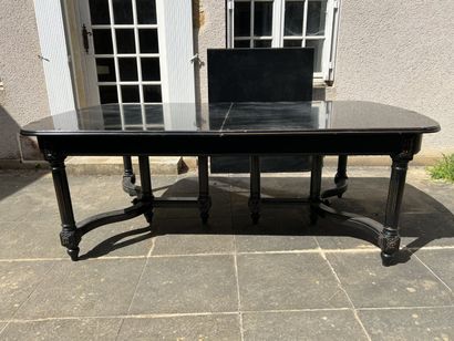 Large blackened carved wood extension table,...