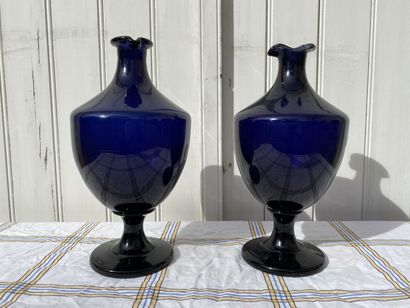 Pair of blue glass medicine jars, XIXth century....