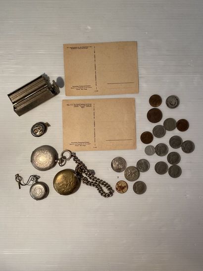 null Lot including a cigarette roll, two postcards of the Luftwafe and a lot of coins

Three...