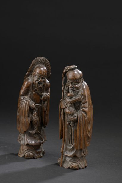 Deux statuettes d'immortels en bambou sculpté...