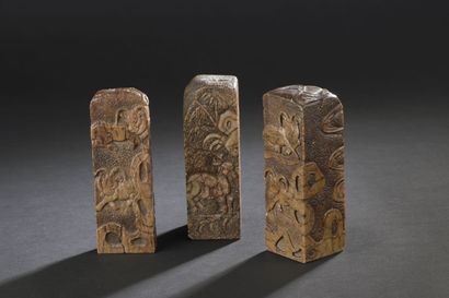 Three soapstone seals 
CHINA 
With carved...