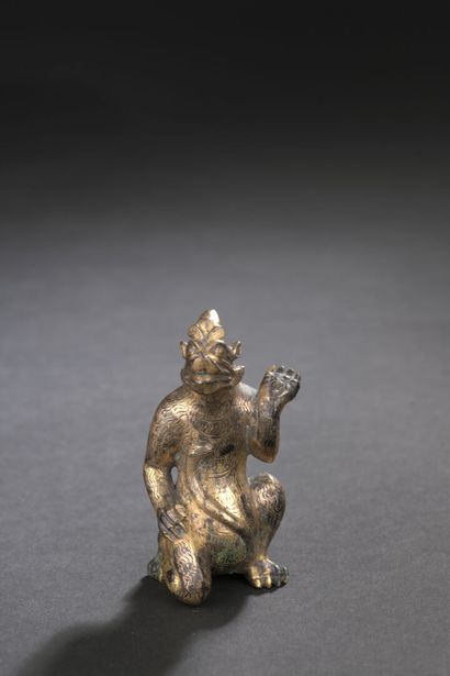null Statuette d'animal fantastique en bronze doré

CHINE

Dans le style archaïque,...