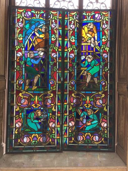 null Pair of stained glass windows, 20th century, in polychrome glass representing...