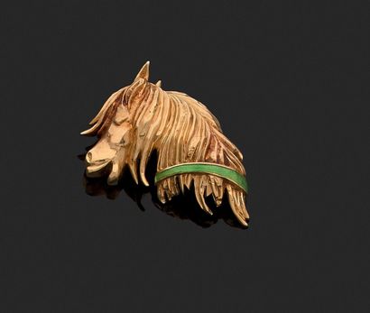 Brooch in the shape of a horse's head in...
