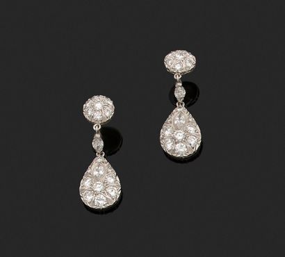 Pair of earrings adorned with a diamond-paved...
