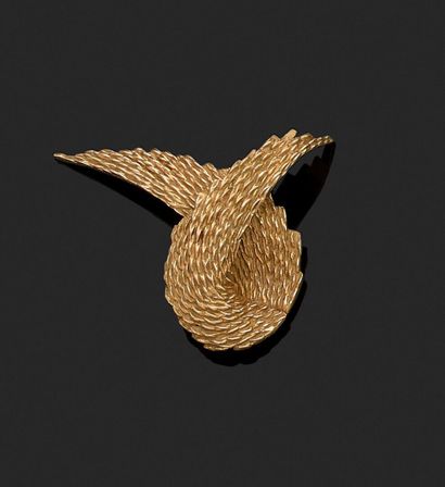 Clip en forme d'ailes stylisées en or jaune...